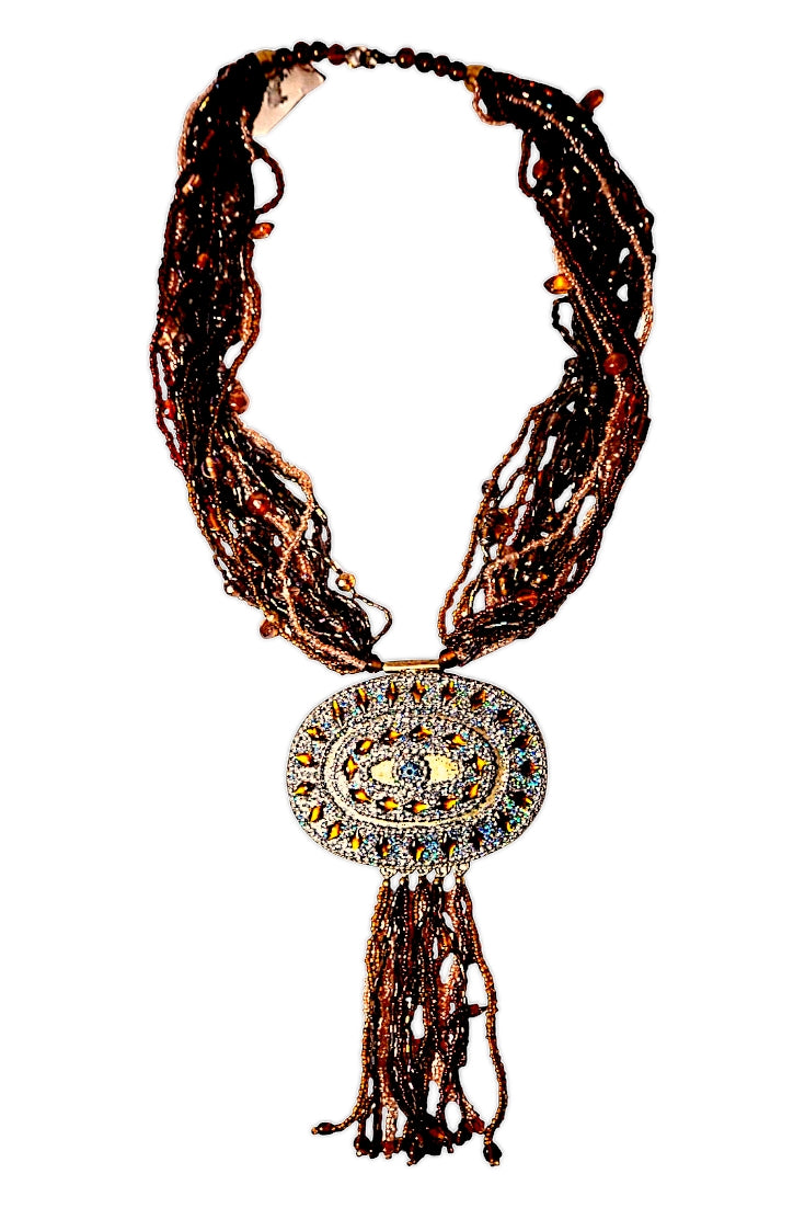Collar artesanal ámbar con medallón y borla