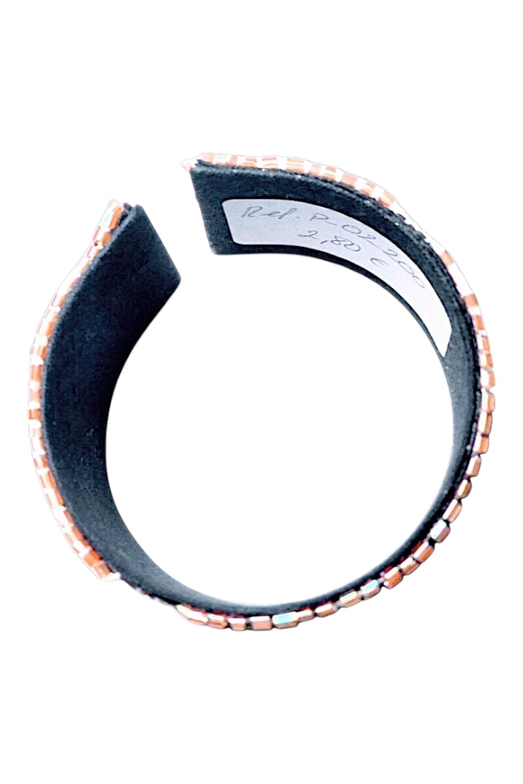 Brazalete azul marino con detalles en forma de flor ámbar