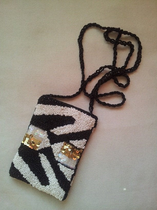 Bolso mini de lentejuelas blanco, oro y negro, con asa larga