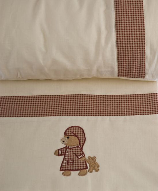 Pack funda nórdica y set sábanas para bebé con diseño en fondo beige y bordado osito para cuna de 70